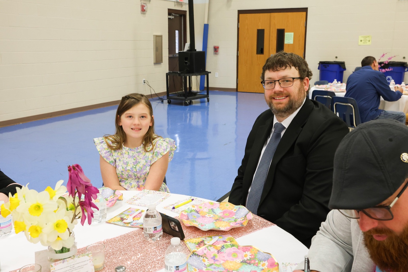 A child and family member at an Ebenezer event