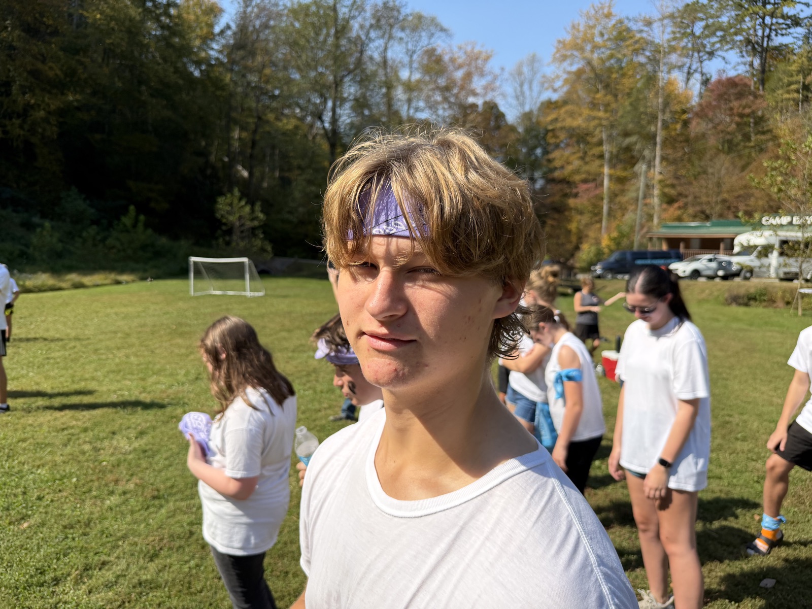 A student participating in an outdoor group activity